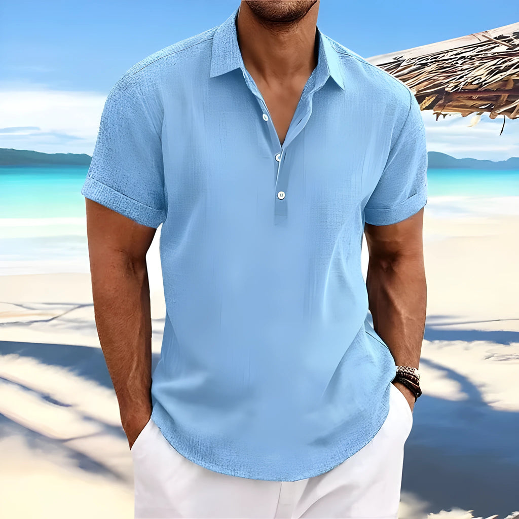Man wearing a light grey, loose-fit cotton blend cardigan with lapels, suitable for casual daily wear.