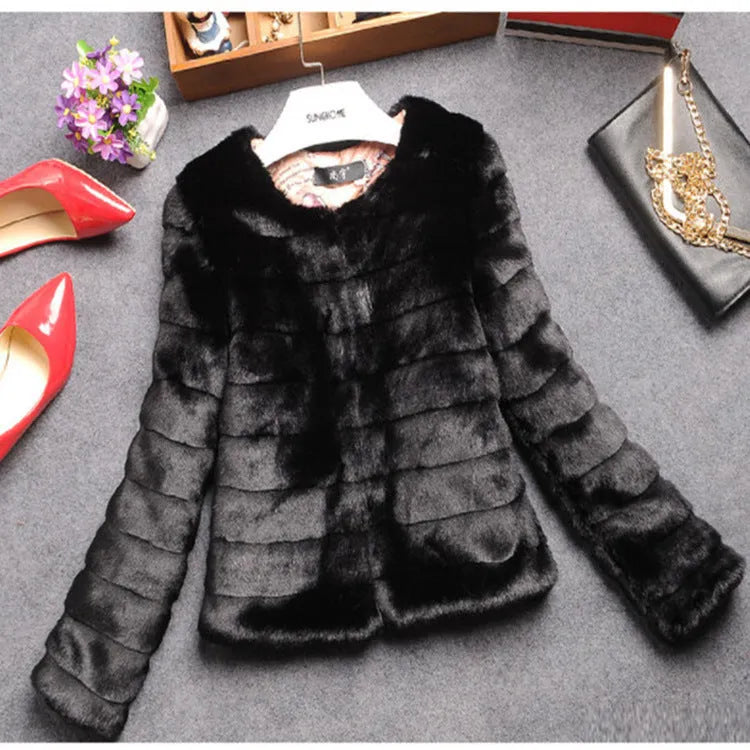 Women's short length faux fur top in beige on a model, showing regular sleeves and street fashion style.