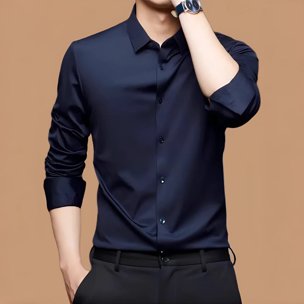 Man wearing a seamless long sleeve elastic shirt in a cardigan style, showing its fit and texture.