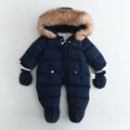 Fleece-lined thick hooded baby jumpsuit in beige with zip front and fur hood