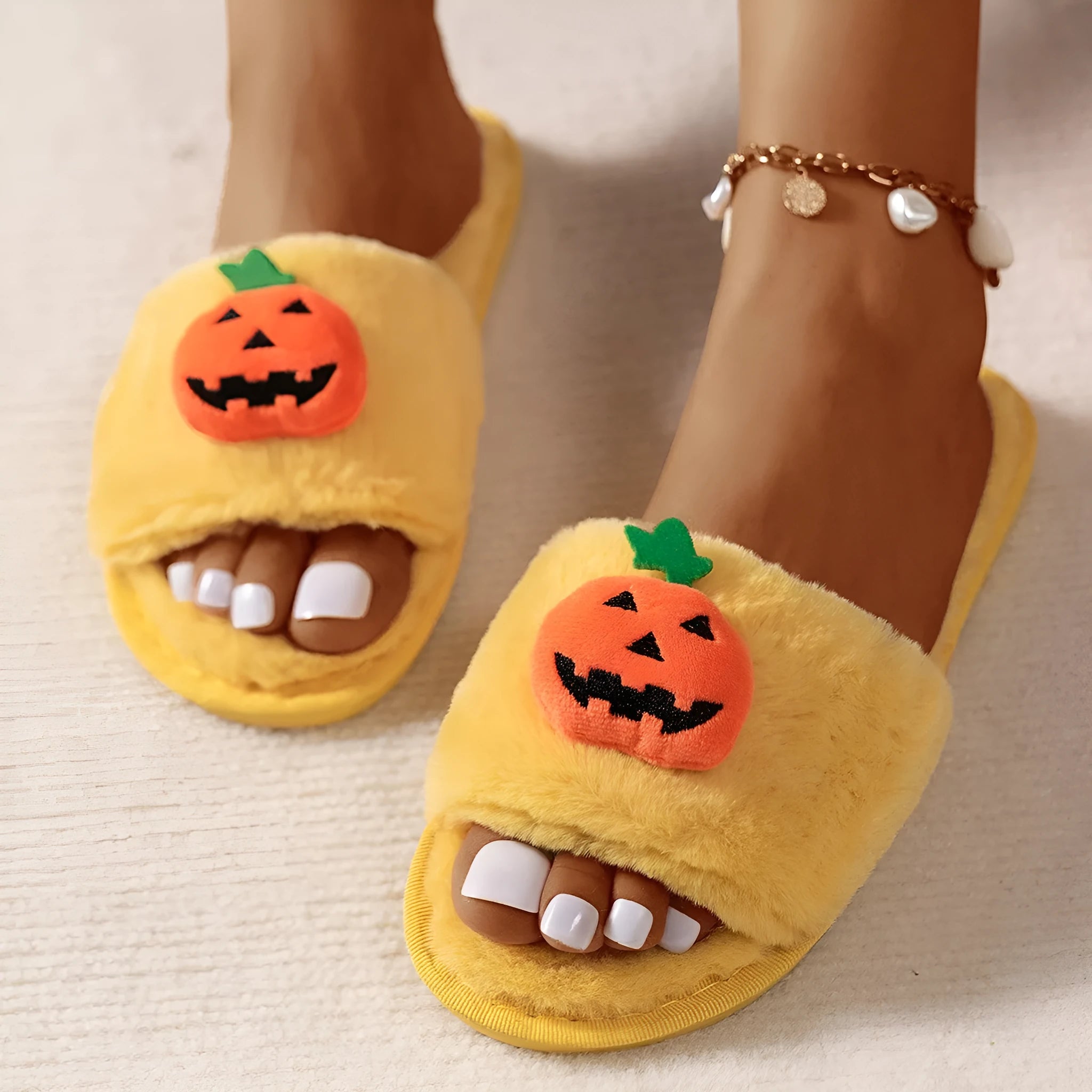 Halloween pumpkin plush slippers with cartoon design on synthetic fur upper, open toe style