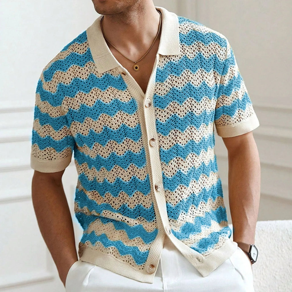 Man wearing a blue short-sleeve sweater with a textured hollow jacquard corrugated pattern and flocked detail.