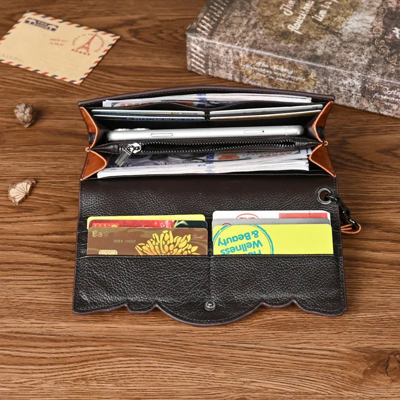 Retro brown tri-fold women's wallet with embossed floral pattern, showing card slots and folded profile.