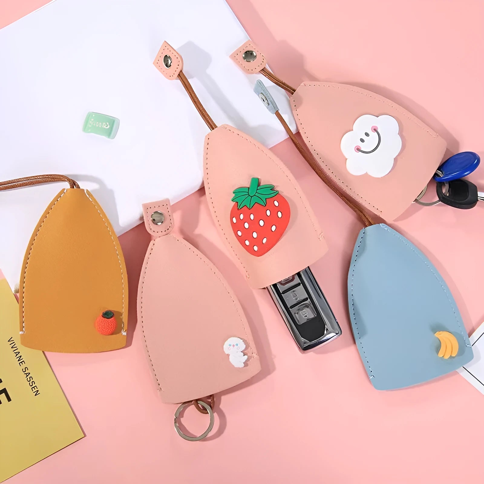 Cartoon pull-out key case protector in PU leather with elastic strap for car keys