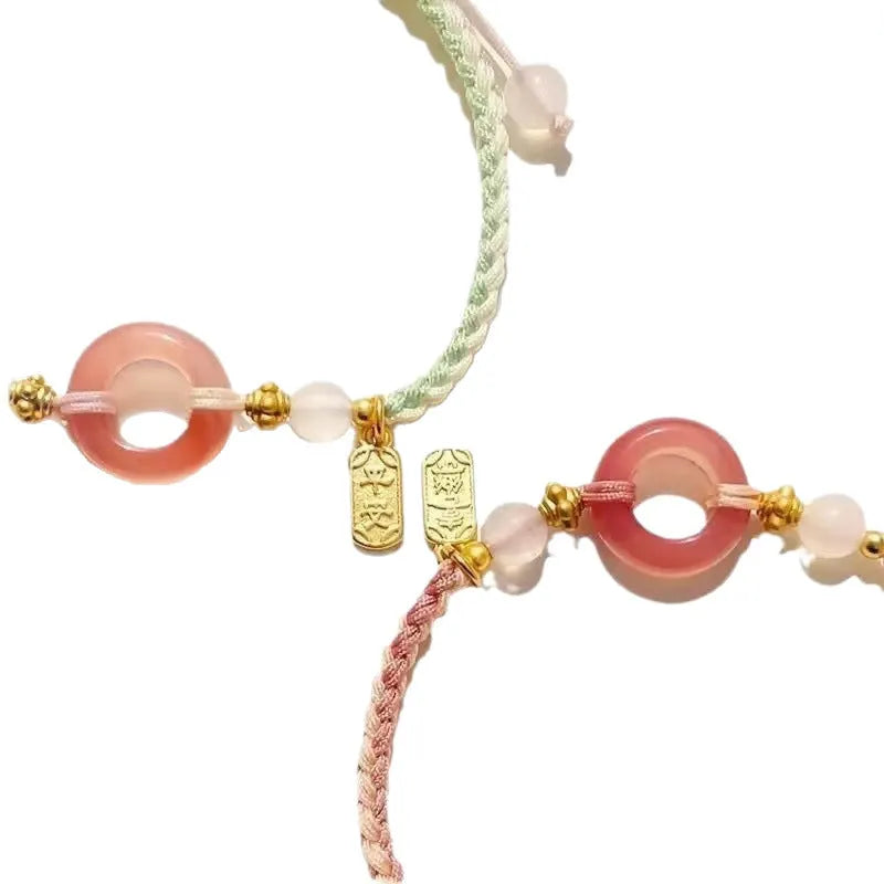 DIY woven watch band with peach blossom pattern in black, green, or pink colours