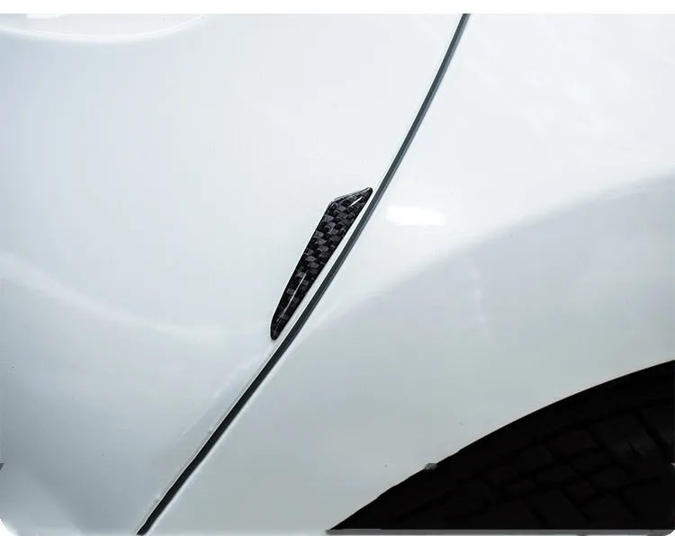 Roll of carbon fibre bumper film adhesive wrap in black and silver colours for car door body protection