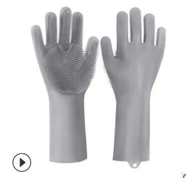 Blue silicone gloves with textured palm for scrubbing, shown on hands holding a pan.