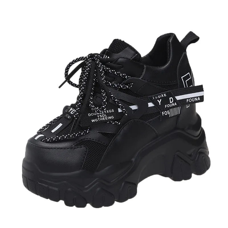 White women's low-top mesh platform sports shoes with a cross strap and rubber sole.