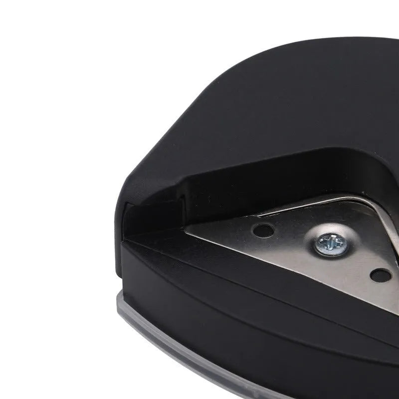 Black plastic and metal business card corner cutter for rounding photo edges.