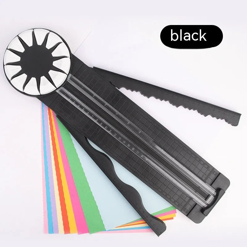 Pink plastic multifunctional 12-in-1 paper cutter and scoring board with size guides.