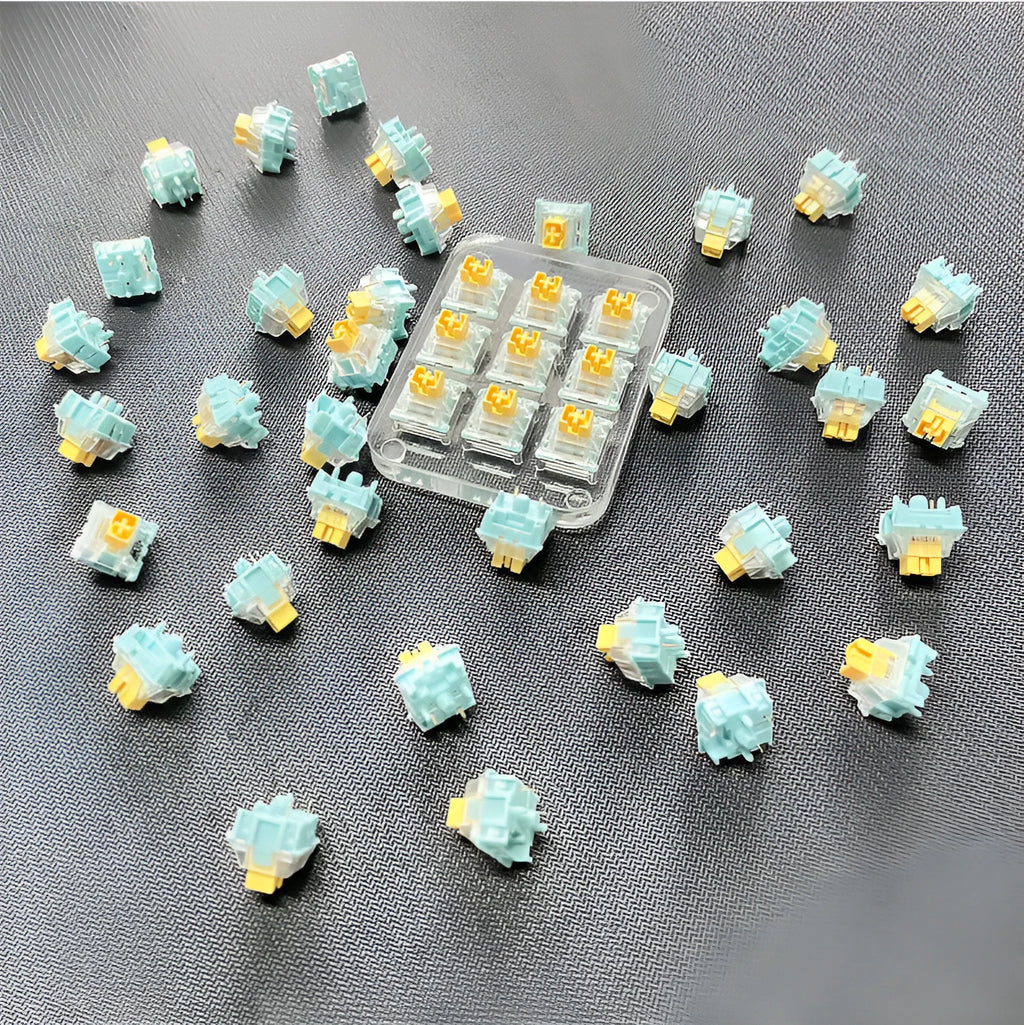 Pack of 36 Tiger Mo Sea Salt Lemon PRO Mute coloured mechanical keyboard switches.