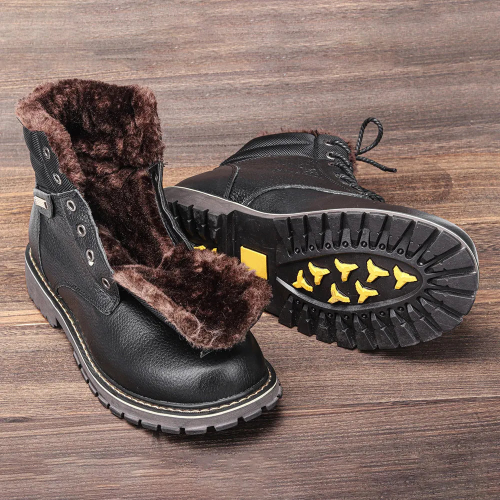 Pair of black plus size men's cowhide leather snow boots with fleece lining, mid-calf height and rubber sole.