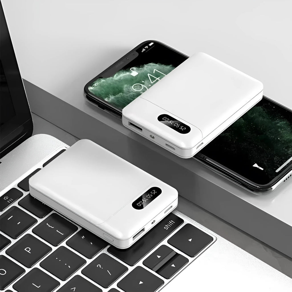 Black and white plastic power bank with dual USB ports showing 92x63x23mm dimensions
