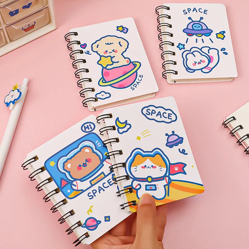 Astronaut-themed portable flipper notebook showing 10.5 by 8 cm size and colourful cover options.