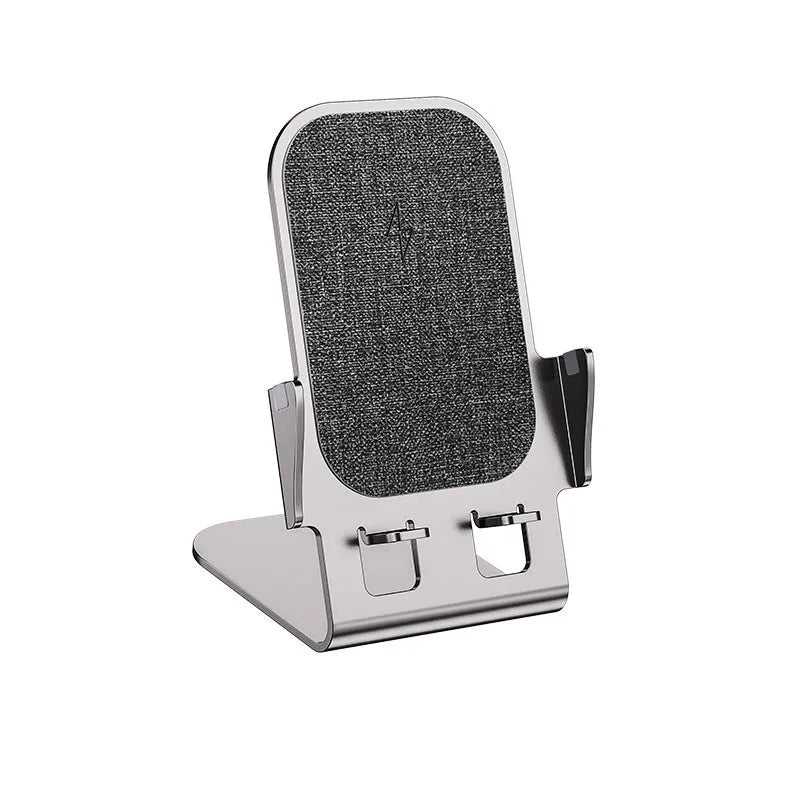 Cyan wireless charging metal desktop stand with aviation aluminium alloy body holding a smartphone upright