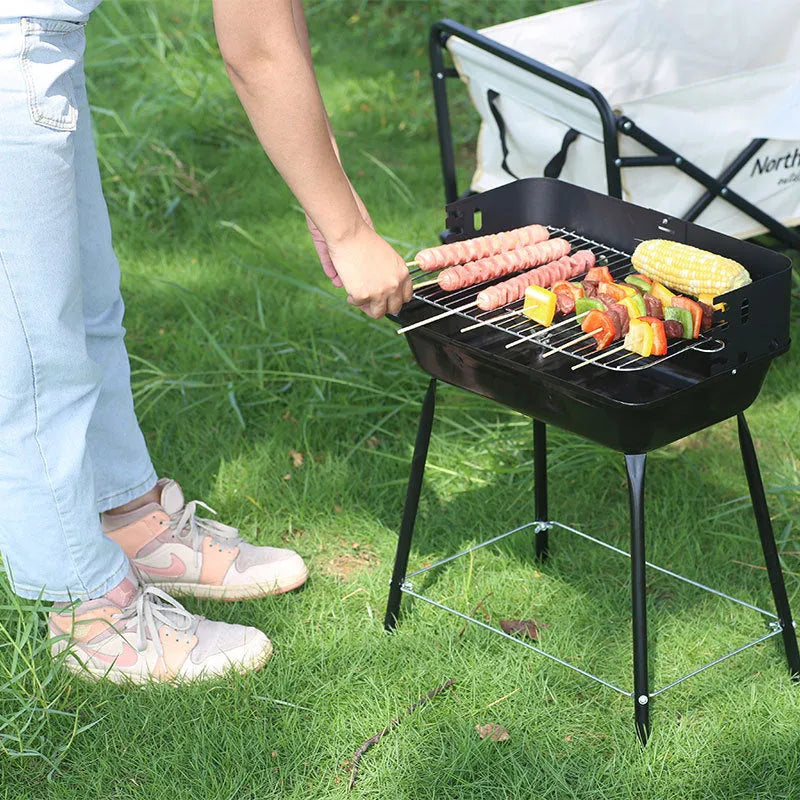 Portable metal barbecue grill, 29x12x44cm, with black grill rack disk for camping and outdoor use