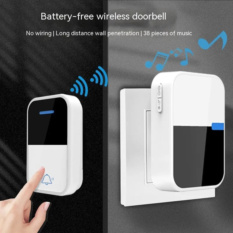 White wireless doorbell kit with plug-in chime and push button on a wooden table