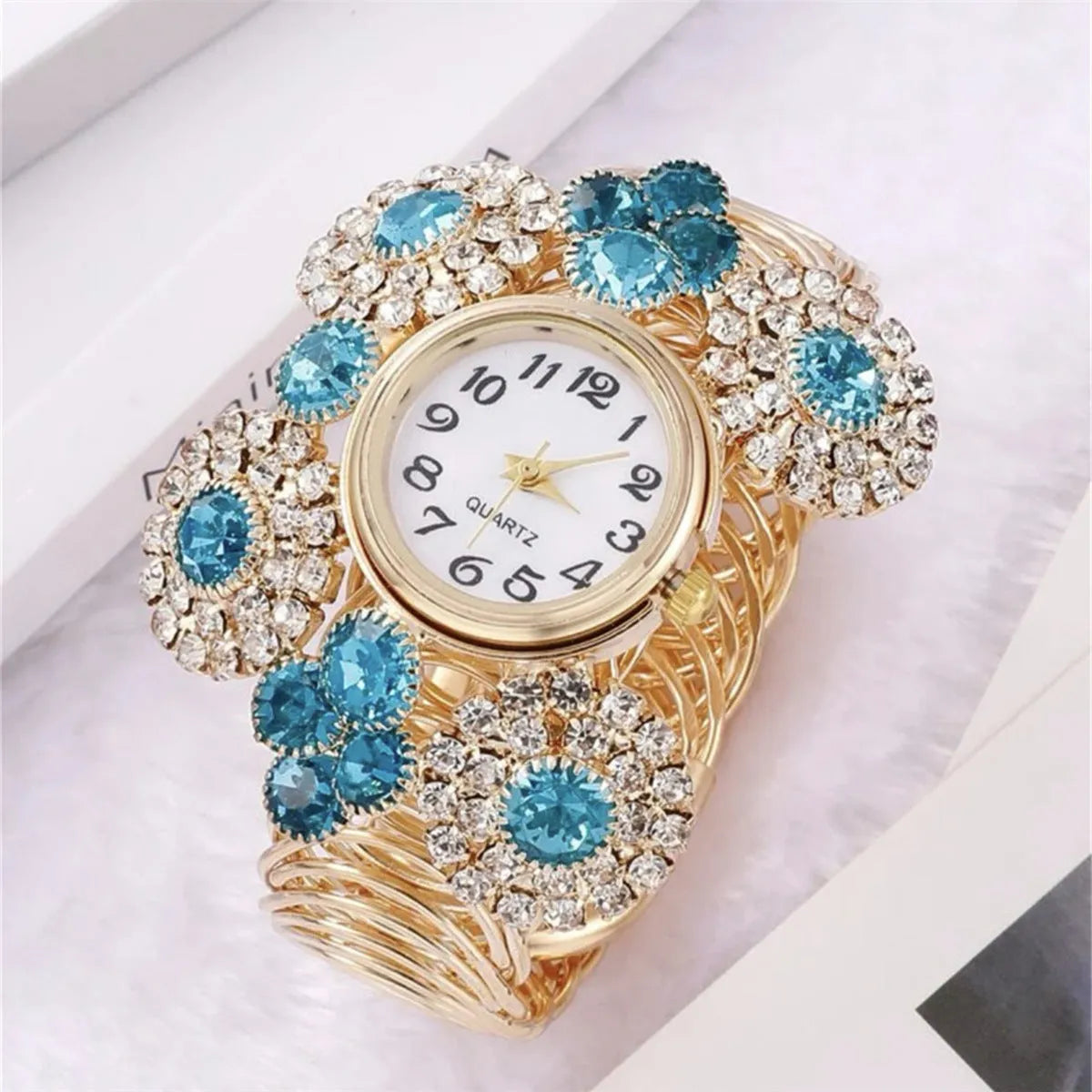 Blue women's quartz watch with rhinestone starry dial, zinc alloy case, stainless steel buckle, 3.5cm dial