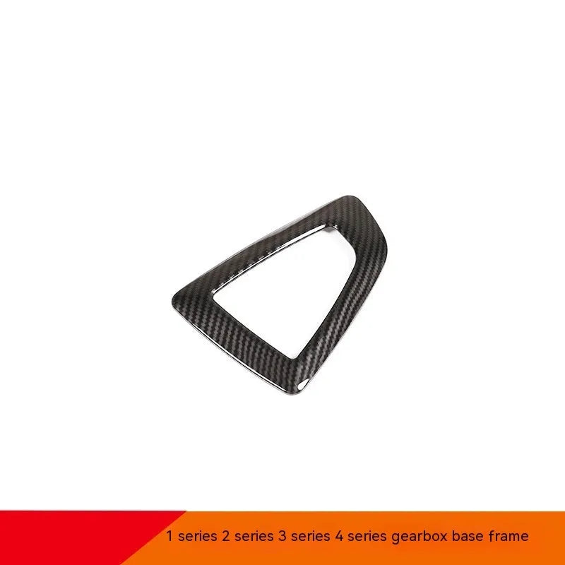BMW dashboard gear base frame accessory with carbon fibre pattern and 3M adhesive backing