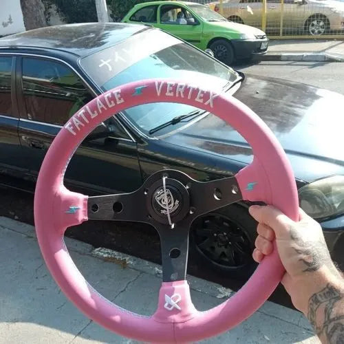 Pink leather steering wheel cover with embroidery detail and aluminium bracket