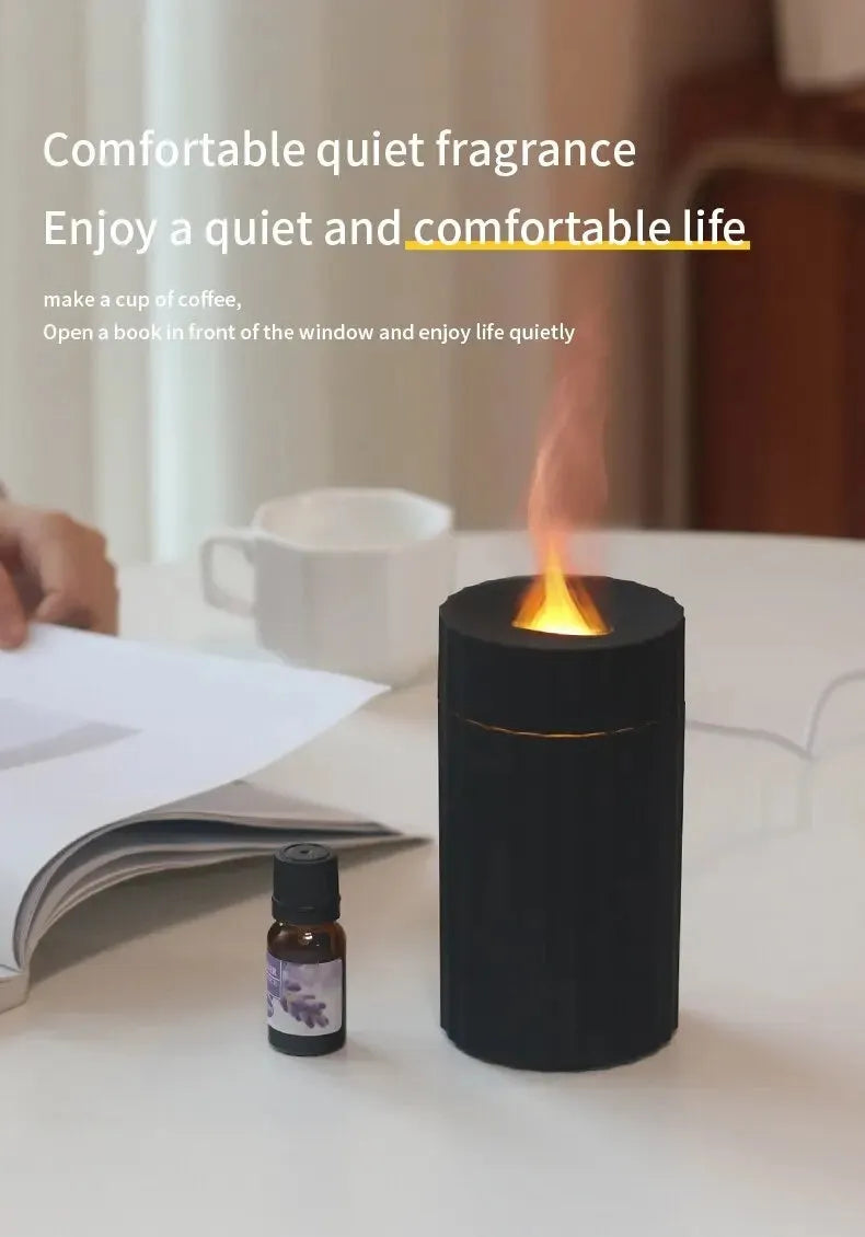 Black and white air humidifier with flame effect lighting and essential oil diffuser function