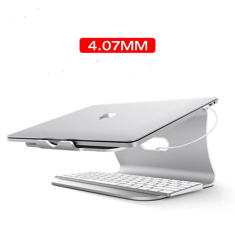 Aluminium laptop cooling stand in grey with rotary hinge for angle adjustment on a wooden desk