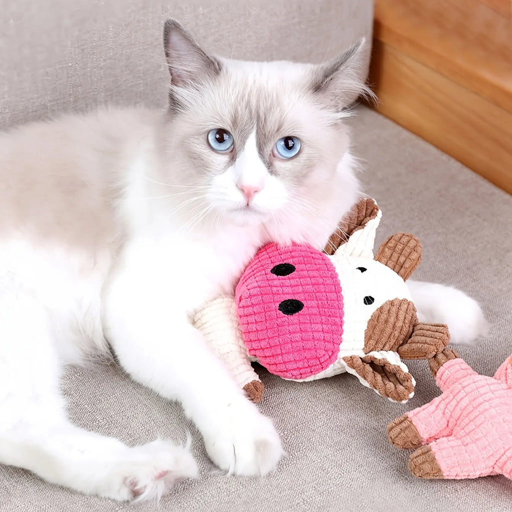 Animal shaped plush squeaky dog chew toy in assorted colours including blue, brown, and cow print.
