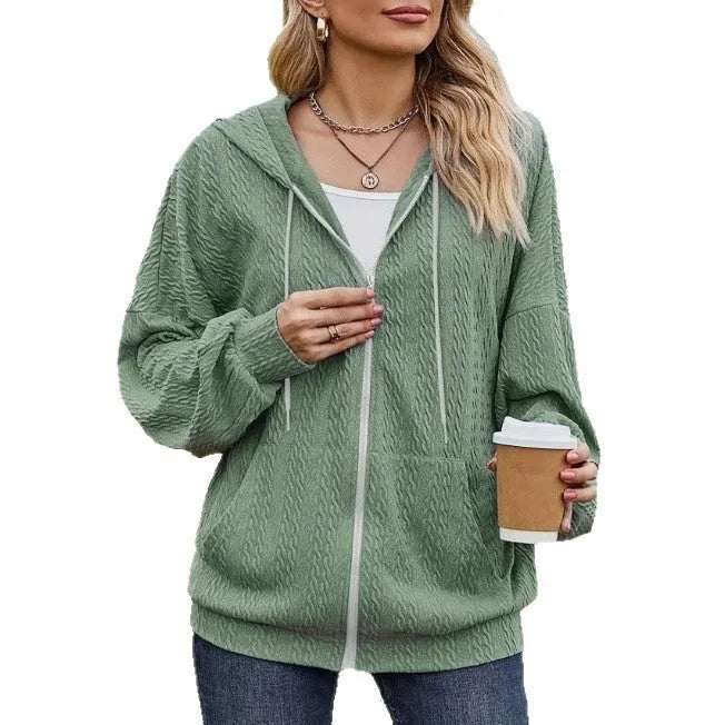 Green women's hooded zip-up sweater coat with a front zipper, shown in a loose, casual fit.