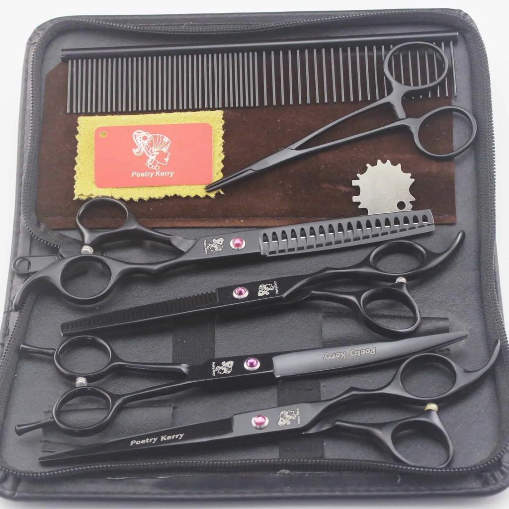 Pet grooming scissors set with straight, curved, and texturing blades in black stainless steel