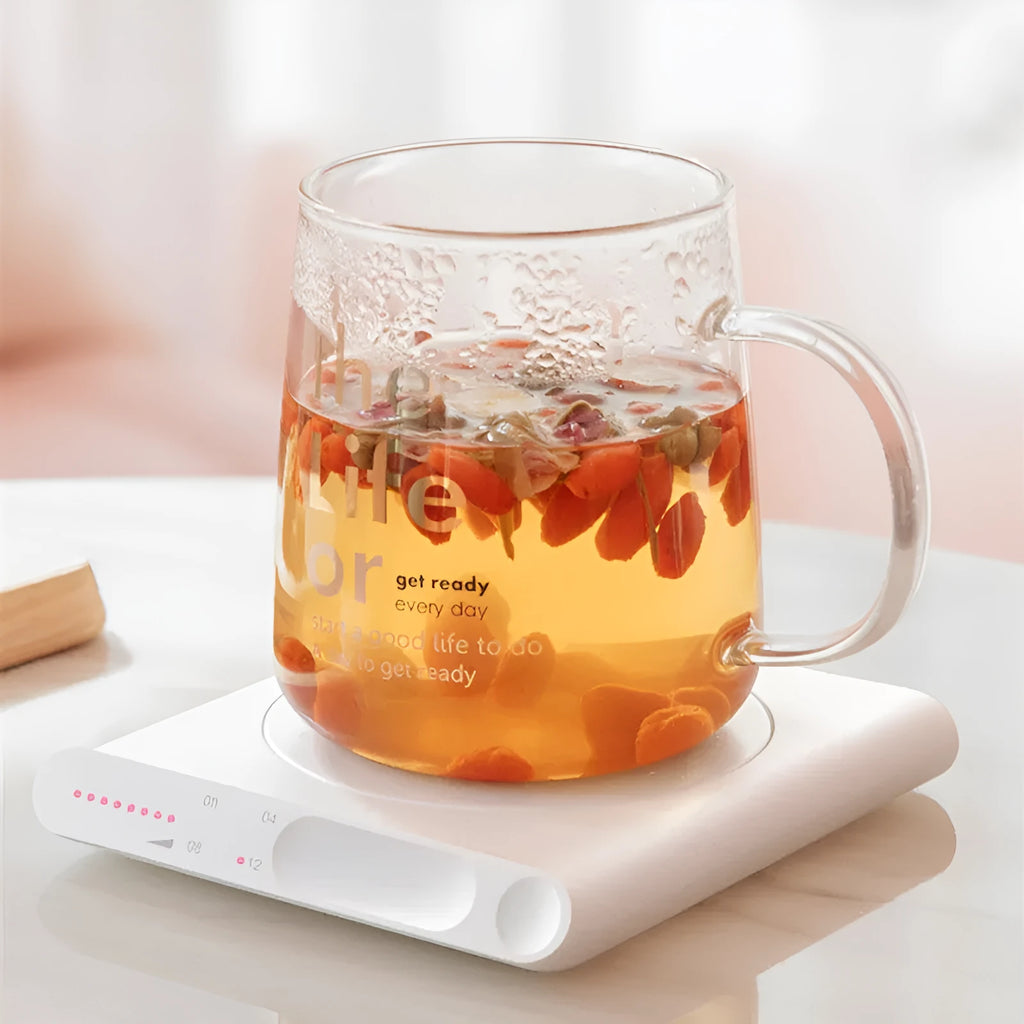 USB heating cup pad coaster in pink or white with mechanical controls