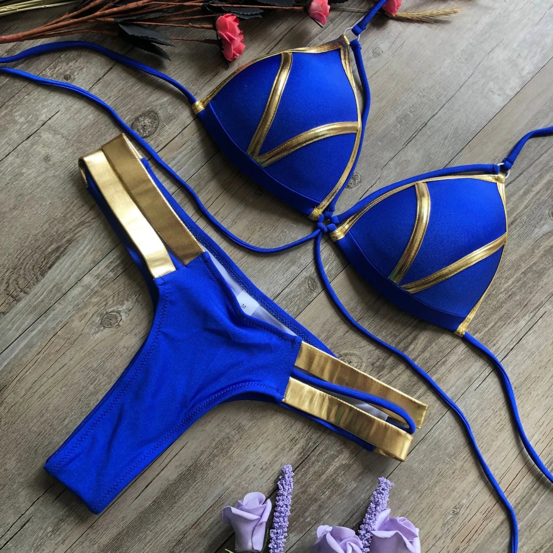 Women's padded bronzing bikini in nylon with cotton lining, no underwire, for swimming.