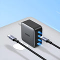 100W gallium nitride charger with multiple USB-C ports showing compact dimensions