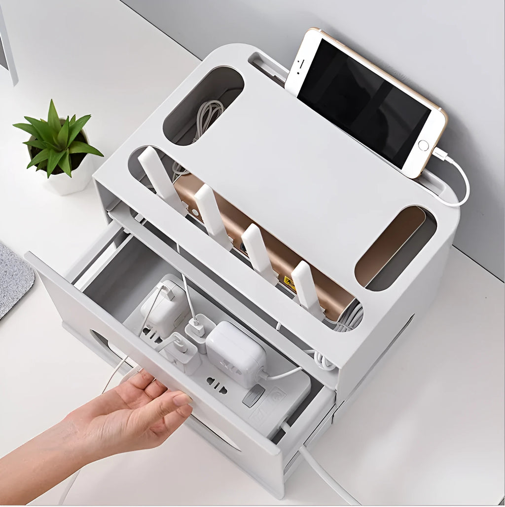 A grey and a white plastic router storage box for organising Wi-Fi routers and network cables.