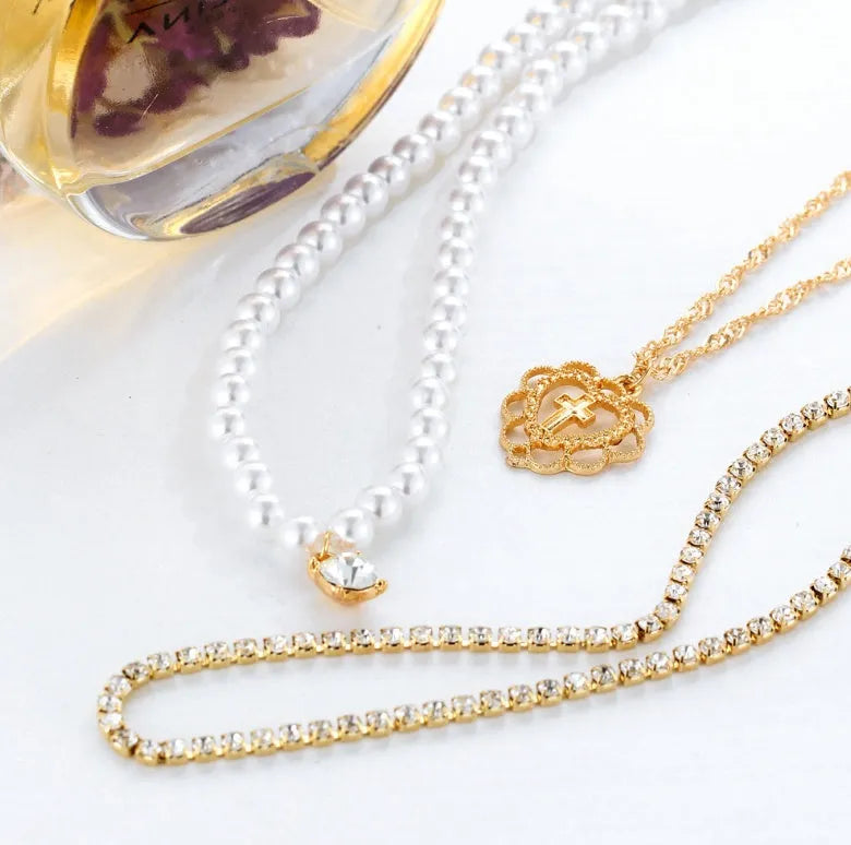 Gold multilayer necklace with heart motif, rhinestones and 6mm imitation pearls, 28-32-40cm chain plus 10cm extension