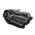 Black 7-inch round LED motorcycle headlight with a polycarbonate lens shown from the front.