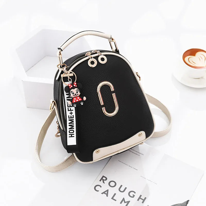 PU leather women's backpack with car suture design, oval shape, and internal zipper pocket
