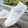 Men's casual sports trainers in black, shown alongside a sizing chart for EU sizes 39 to 44.
