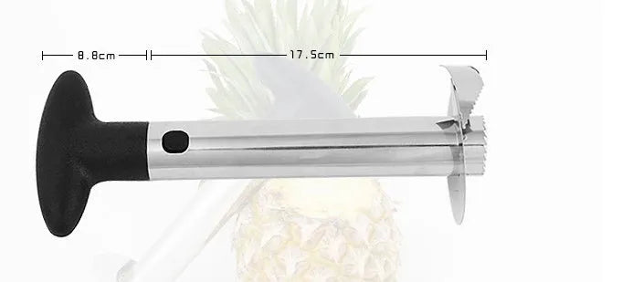 Stainless steel pineapple corer slicer with coloured ABS handle on a kitchen counter.