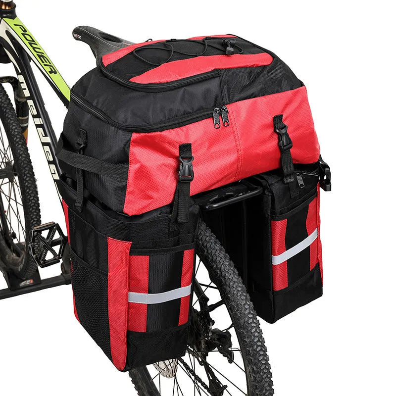 Rhinoceros green 70L bicycle rear storage frame bag mounted on a touring bike.