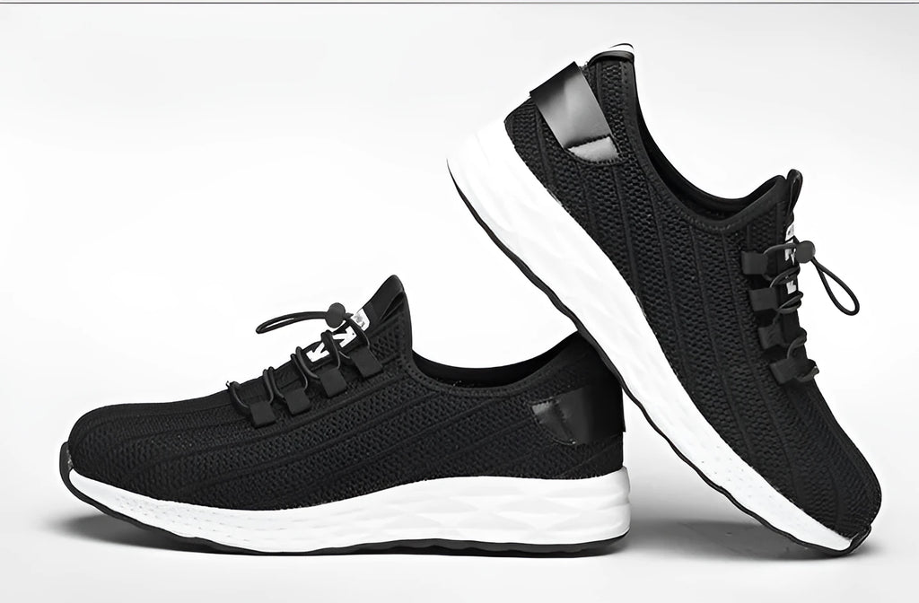 Black low-cut safety shoes with steel toe cap, flying net upper, ventilation holes, anti-skid sole, sizes 36-46.