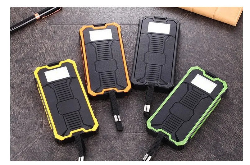 Solar power bank in orange, green, black or yellow with universal charging cable, showing solar panel.