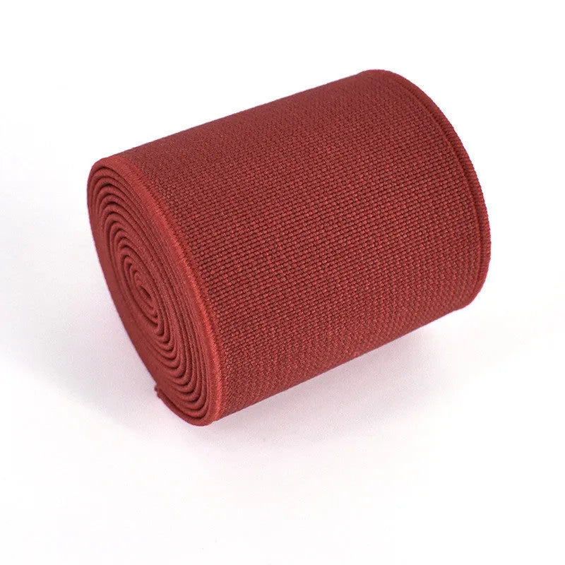 5cm wide colourful elastic band showing ten colour options including black, brown, dark red and blue variants