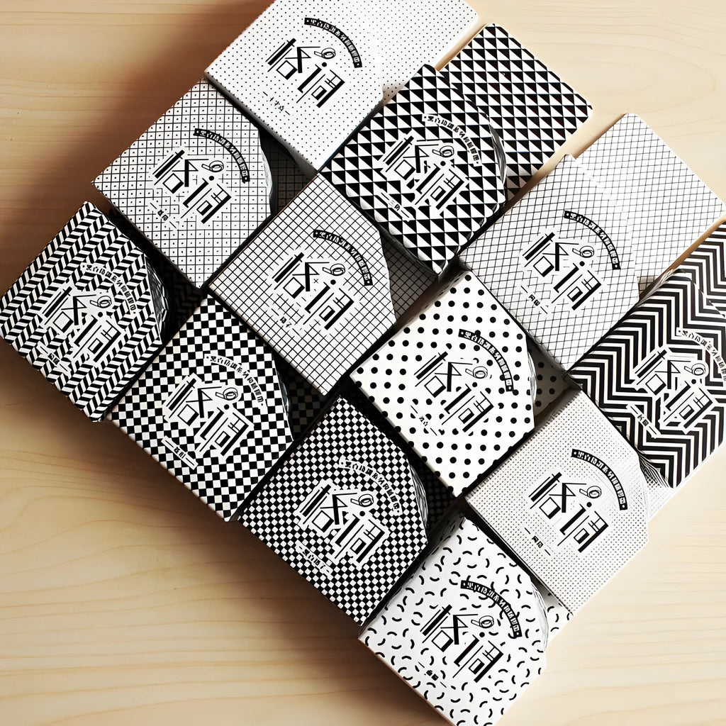 Three rolls of decorative paper tape showing lattice, wave point and weave patterns for craft projects
