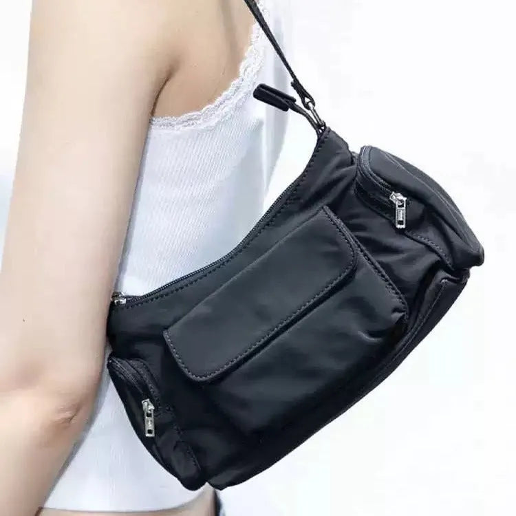 Black PU leather women's shoulder bag with double pockets showing side line design