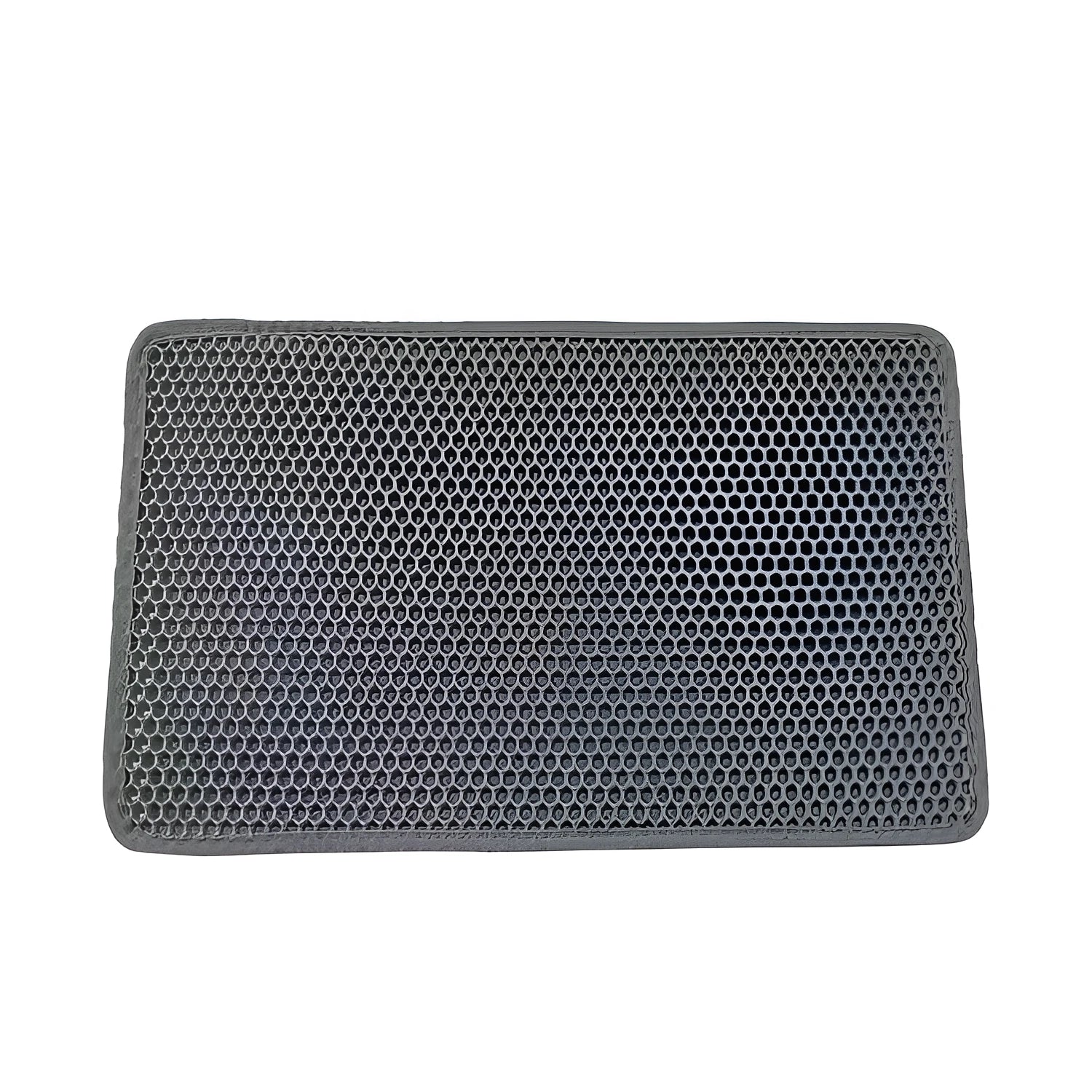 Black EVA foam cat litter pad with honeycomb design beside litter box