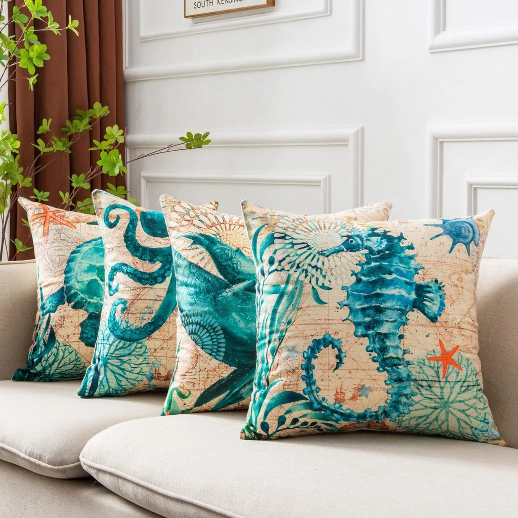 Linen cushion cover with detailed sea turtle print, measuring 45x45cm, on a sofa.