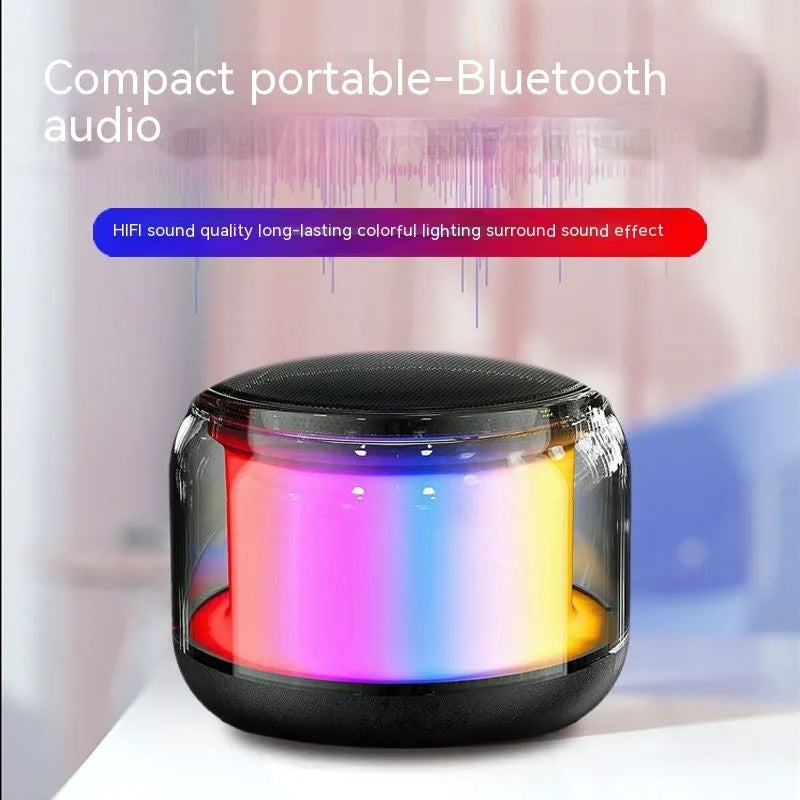 Black pistol-shaped Bluetooth speaker with colour glaze finish on desktop