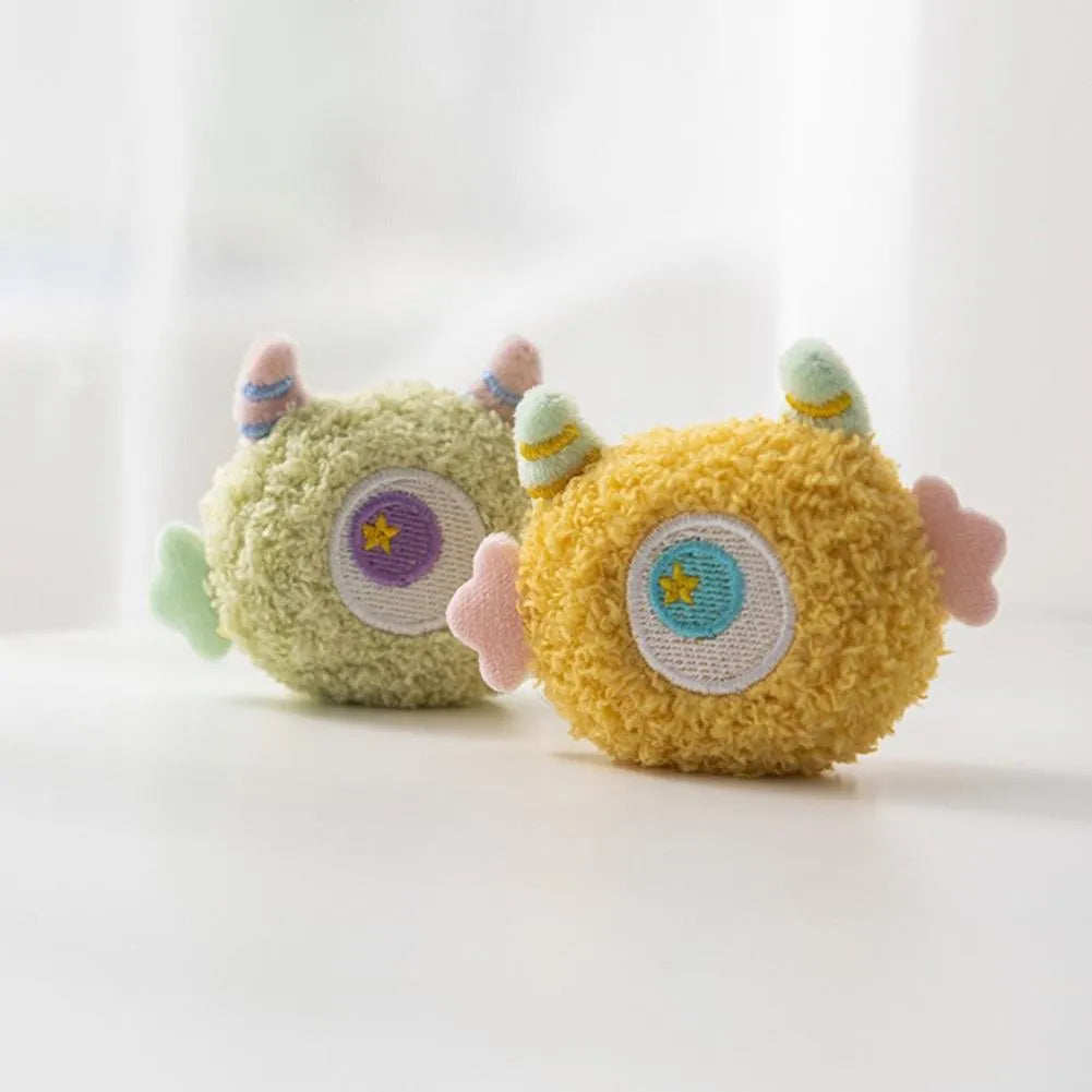 Cartoon-shaped plush dog chew toy with large eyes and squeaker sound feature