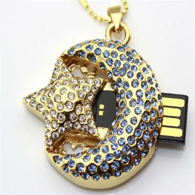 Silver Jewelry Xingyue metal USB flash drive with USB Type-A connector on a plain background.