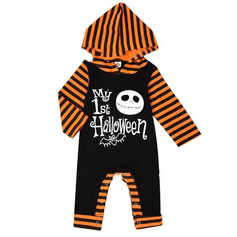 Black or brown cotton Halloween romper with long sleeves and a hood, laid flat.